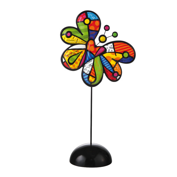 Colorful butterfly-shaped decorative item on a black stand against a white background by Romero Britto available at Spacio retail and online stores in India. 
