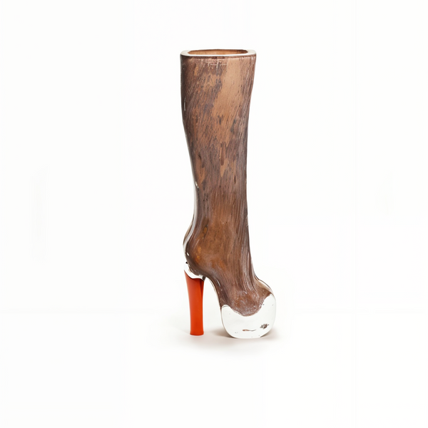 Luxury glass vase shaped like a high heel boot in vibrant orange from Henry Dean, hand made in Belgium, available at Spacio India for artistic home styling