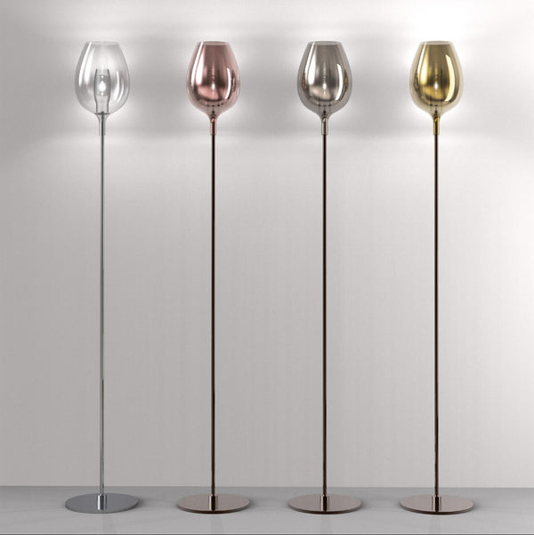 Four floor lamps with different coloured glass shades on a plain background from Italamp available at Spacio in India. 