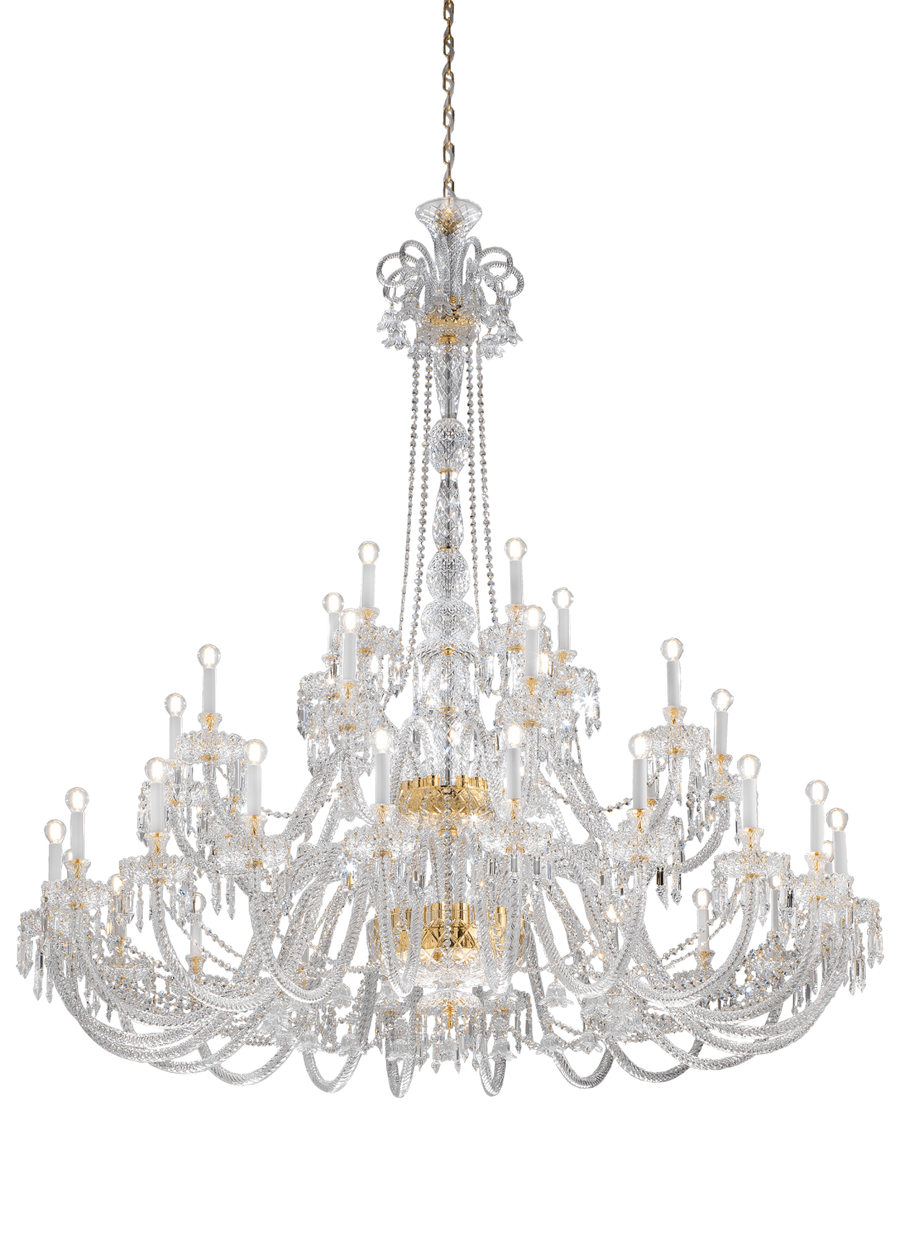 Large Italamp Dogma chandelier suspended from gold chain, highlighting its majestic scale and refined Italian design, featured at Spacio India.
