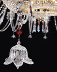 Crystal flower pendant detail from Italamp Dogma chandelier, designed in Italy with ornamental elegance, now at Spacio India.