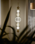 Elegant view of Italamp Greta Suspension Lamp in a dim interior with soft shadows, highlighting its intricate crystal design – Spacio India.