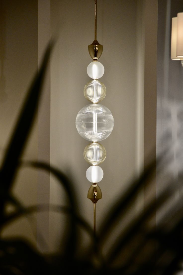 Elegant view of Italamp Greta Suspension Lamp in a dim interior with soft shadows, highlighting its intricate crystal design – Spacio India.