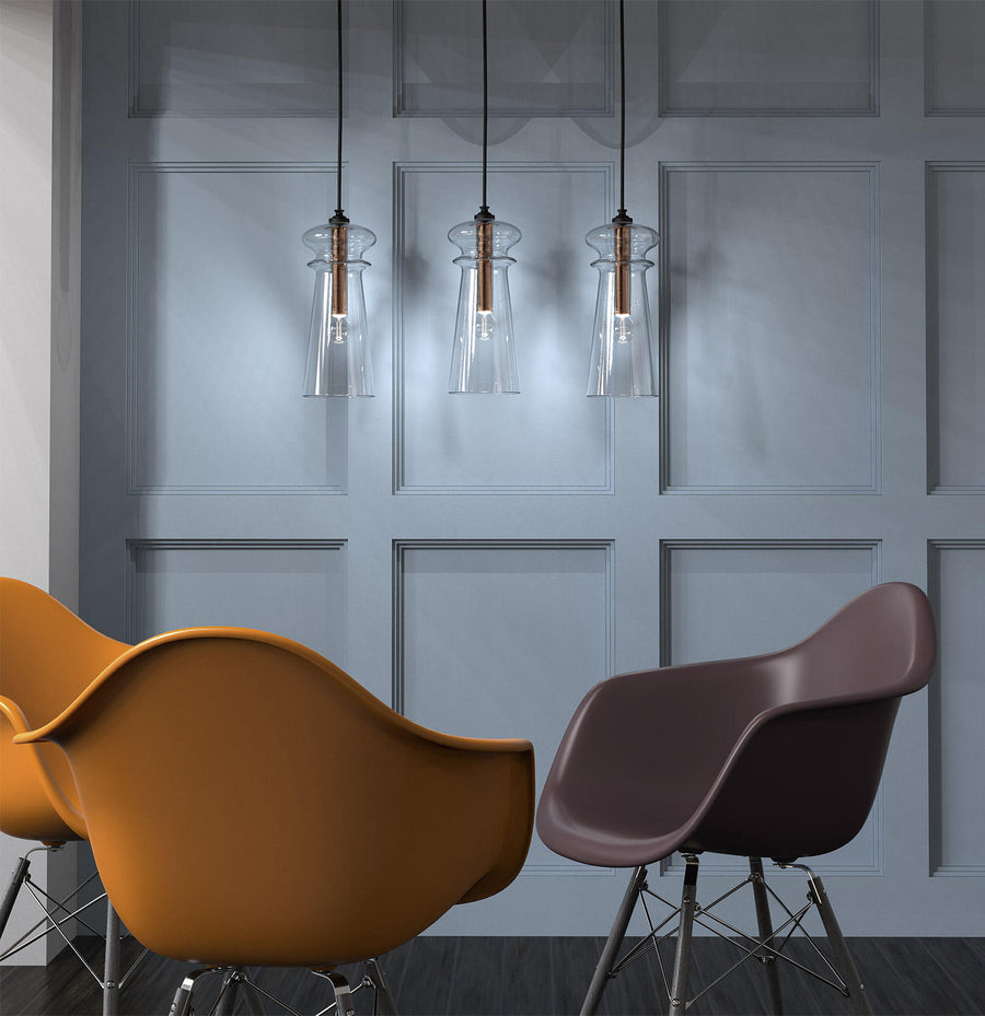 Modern arrangement of Italamp Licio suspension lights with brushed metal and clear glass, showcased in a contemporary space. Spacio India.