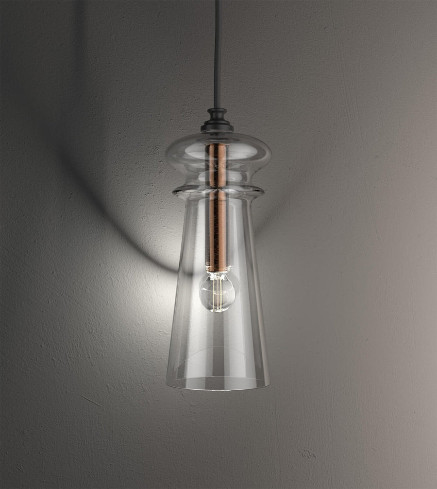 Close-up of Italamp Licio pendant with flared clear glass diffuser and metal core, a blend of elegance and clarity. Spacio India.