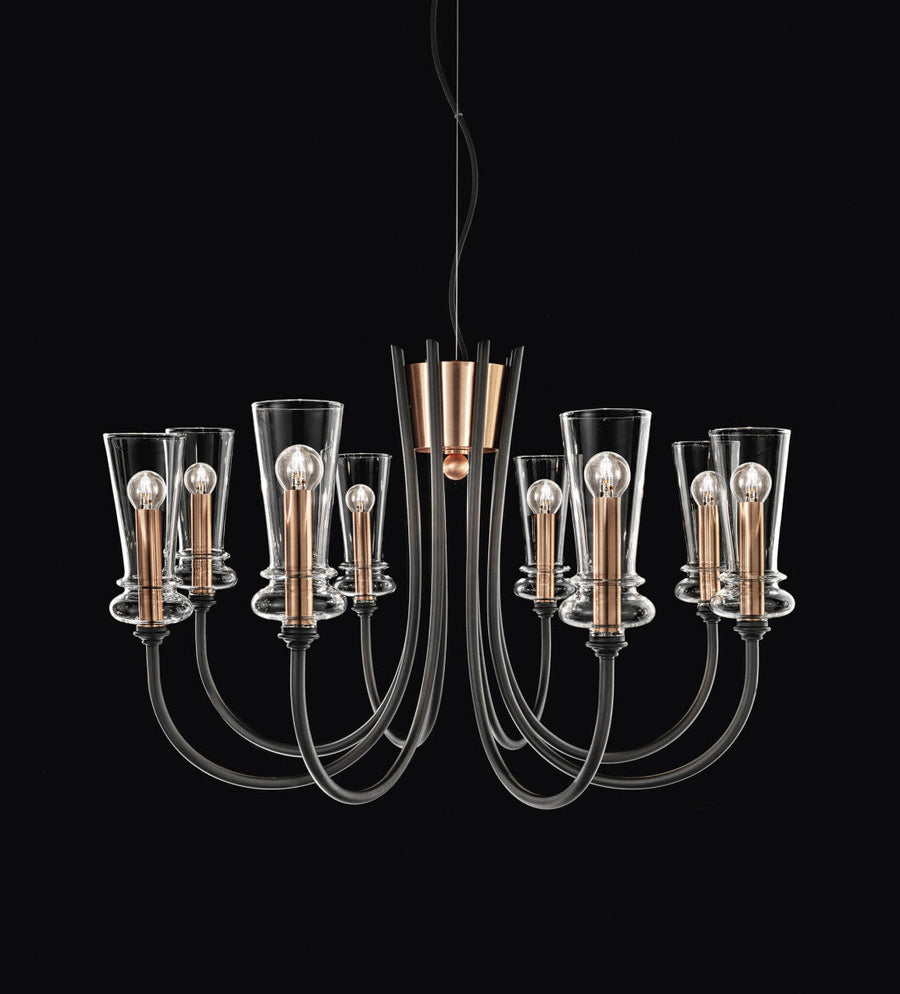 Italamp Licio chandelier with eight arms and transparent diffusers, fusing classical grace with Italian modernity. At Spacio India.