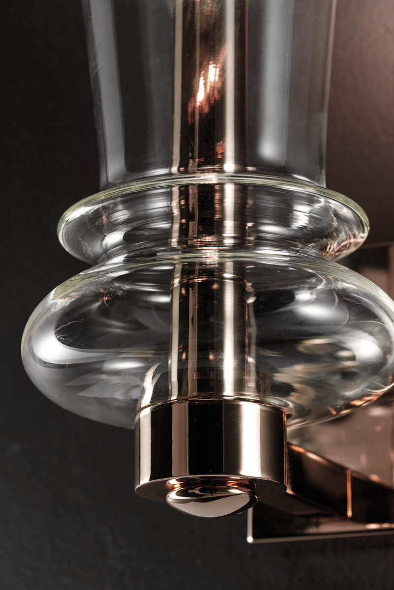 Macro image of Italamp Licio wall lamp highlighting glass and metal textures. Premium wall lighting available at Spacio India.