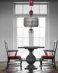 Italamp Odette Odile suspension lamp styled in a dining room with red velvet chairs, luxury Italian lighting at Spacio India