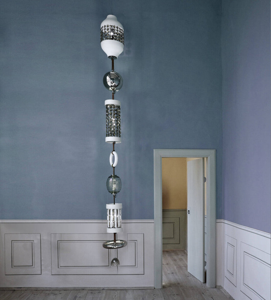 Italamp Odette Odile floor-to-ceiling suspension lamp in neutral tones, dramatic vertical lighting piece from Italy available at Spacio India