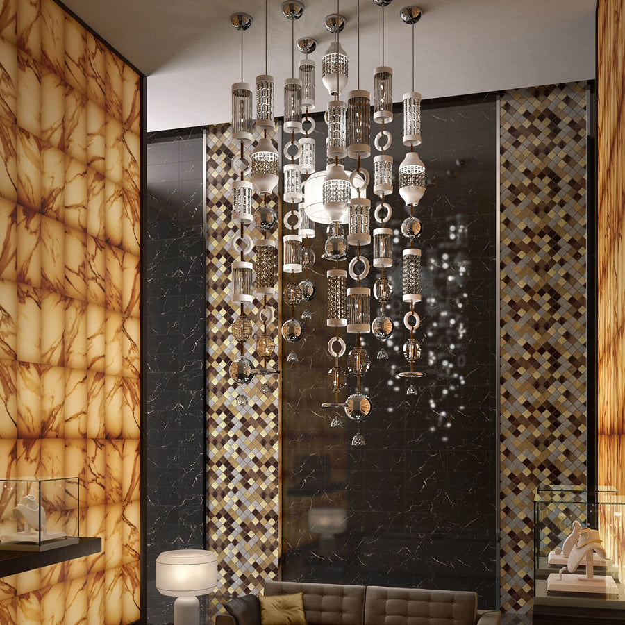 Cluster installation of Italamp Odette Odile pendant lamps in a double-height foyer, grand lighting concept by Italamp at Spacio India