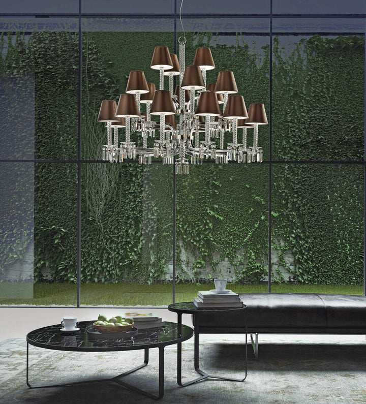 Italamp Prezioso Suspension Light in a modern living room setting with greenery backdrop, showcasing luxury crystal chandelier lighting at Spacio India.