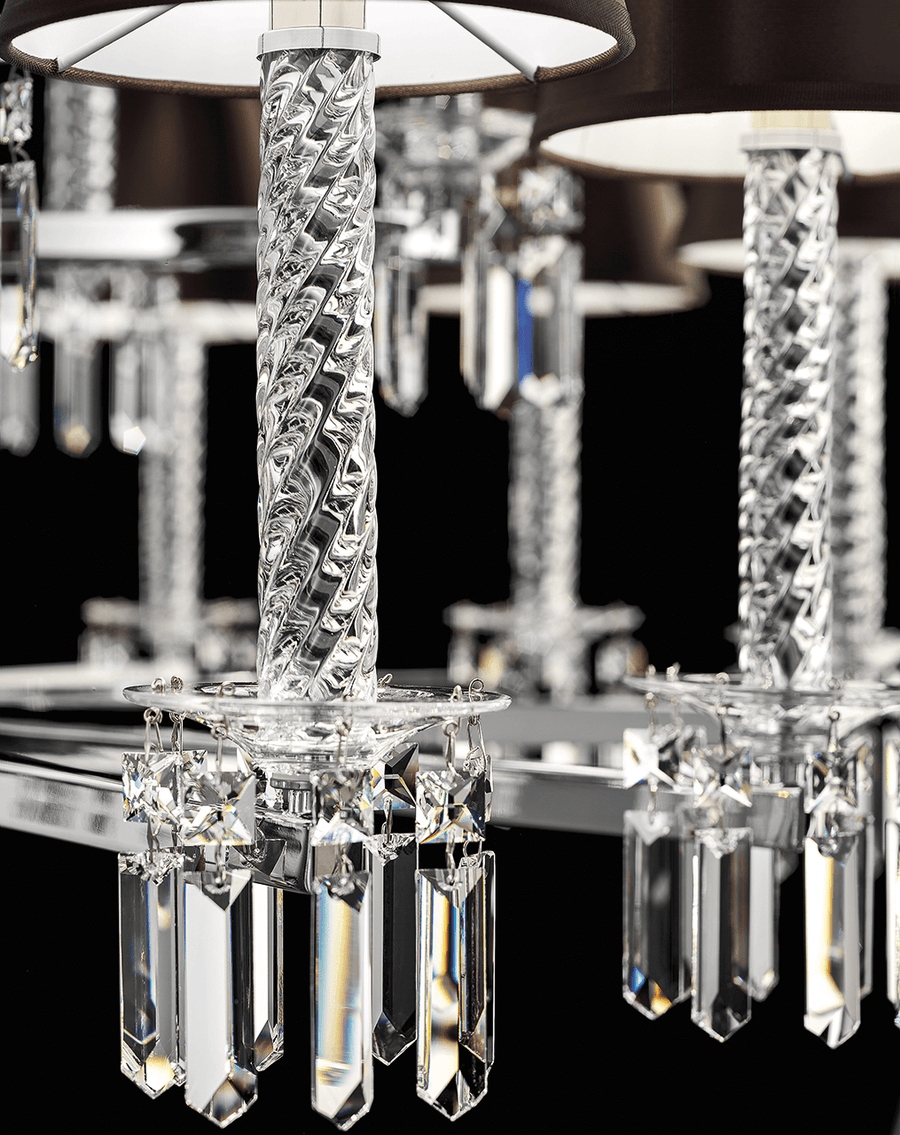 Detail view of twisted crystal stem and prism cut glass drops on Italamp Prezioso suspension light, premium Italian chandelier lighting at Spacio India.