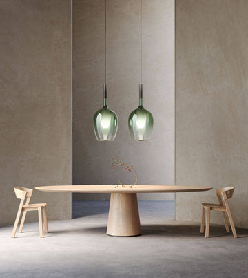 Green Italamp Rose Maxi Pendant Lamp displayed above a dining table, showcasing elegant Italian lighting available at Spacio India.