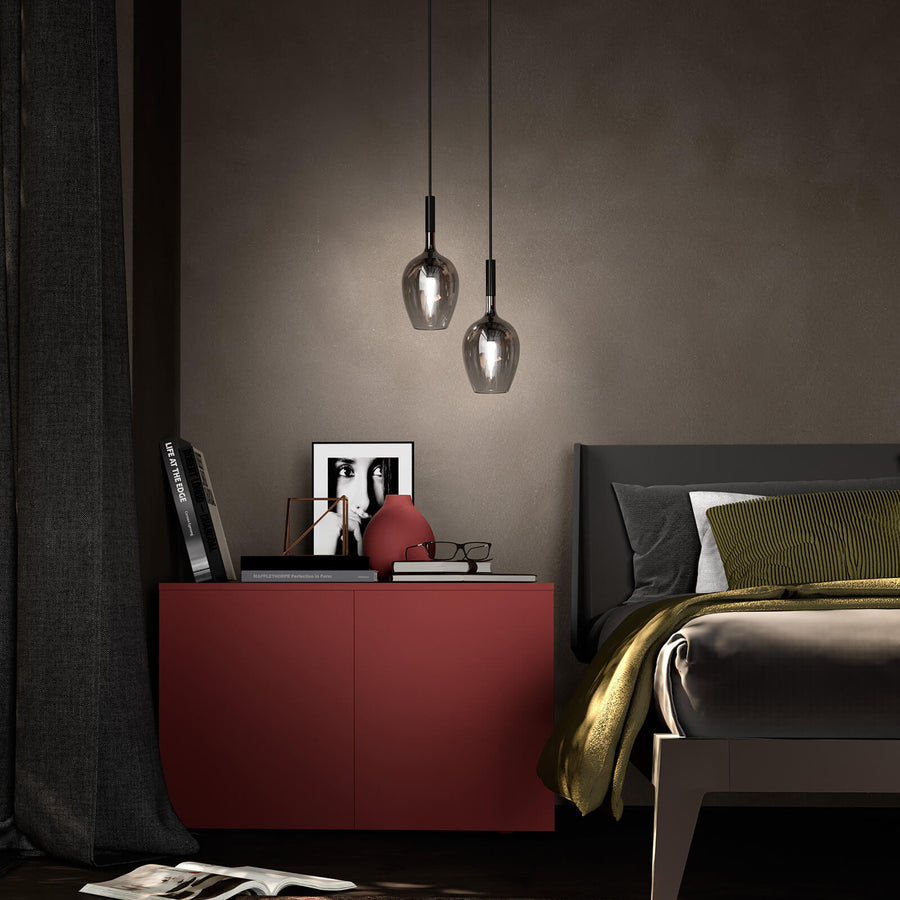 Pair of Italamp Rose Maxi Pendant Lamps installed in a modern bedroom beside a red console, adding a chic Italian lighting accent from Spacio India.