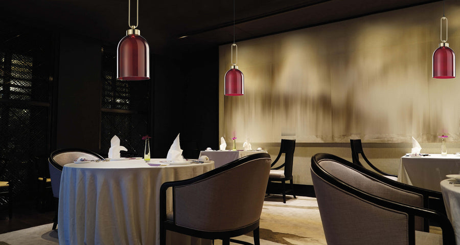 Italamp Valentina red pendant lamps in fine dining setting, luxury lighting available at Spacio India