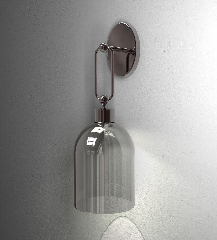 Close-up of Italamp Valentina wall lamp with grey smoked glass and metallic frame, at Spacio India