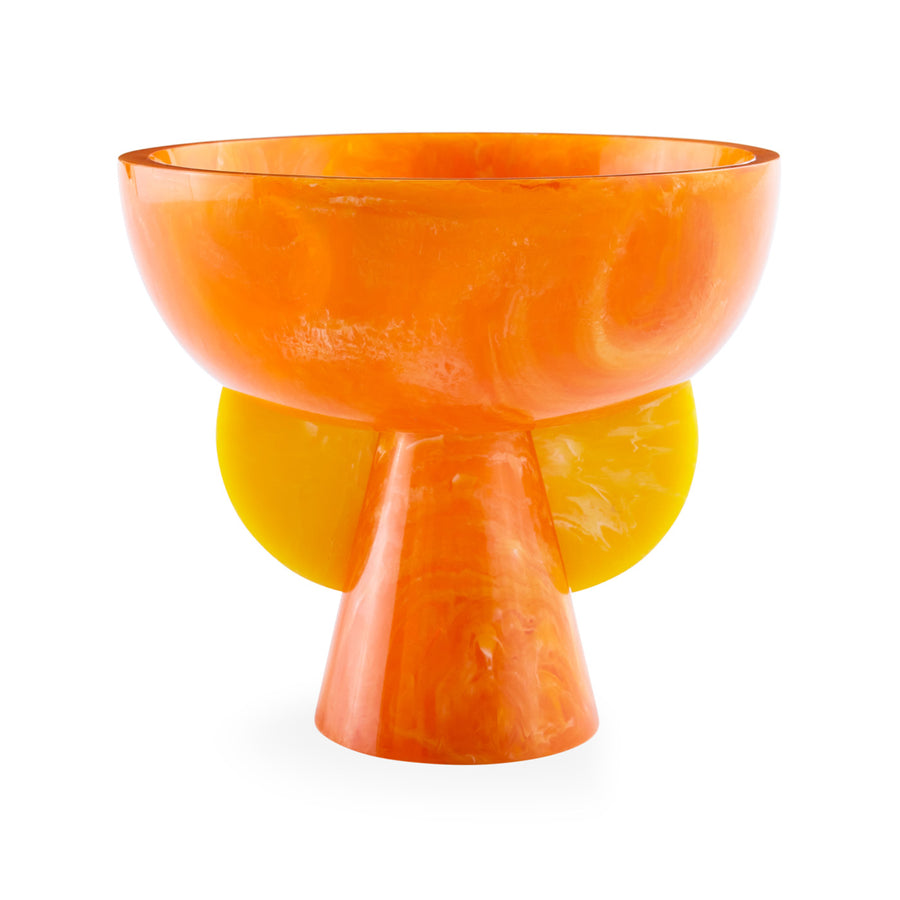 A JA Mustique Pedestal Bowl Orange Yellow by Jonathan Adler on a white surface.