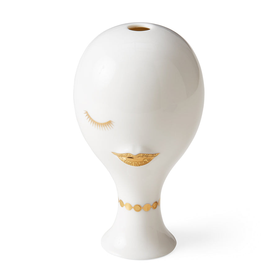 A feminine vessel with a gilded muse face, inspired by the Jonathan Adler JA Vase Glided Muse Misia.