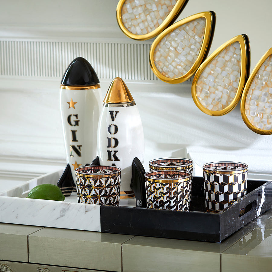 Jonathan Adler Rocket Gin decanter with other drink ware accessories in a decorative tray available at Spacio India for Luxury Homes collection of Bar Accessories