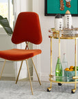Rum & Whiskey decanters from Jonathan Adler with a bar accessories in a interior space.