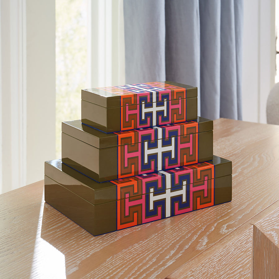 Jonathan Adler Lacquer Madrid Large Box showcases a vivid geometric design decorated with other sizes boxes available at Spacio India for luxury home decor accessories collection of decorative boxes.