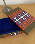 Jonathan Adler Lacquer Madrid Medium opened Box showcases a vivid geometric design on a wood table available at Spacio India for luxury home decor accessories collection of decorative boxes.