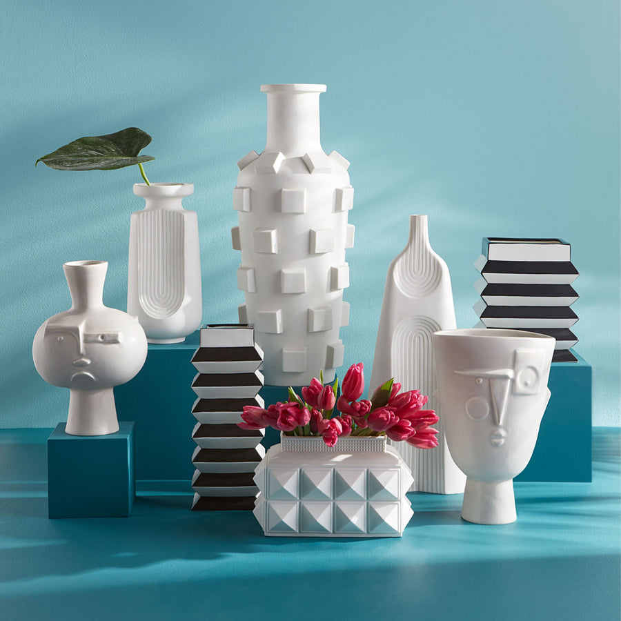 Jonathan Adler Arco large porcelain vase on a pedestal with other collection of Vases available at Spacio India for Luxury Home Decor Accessories collection.