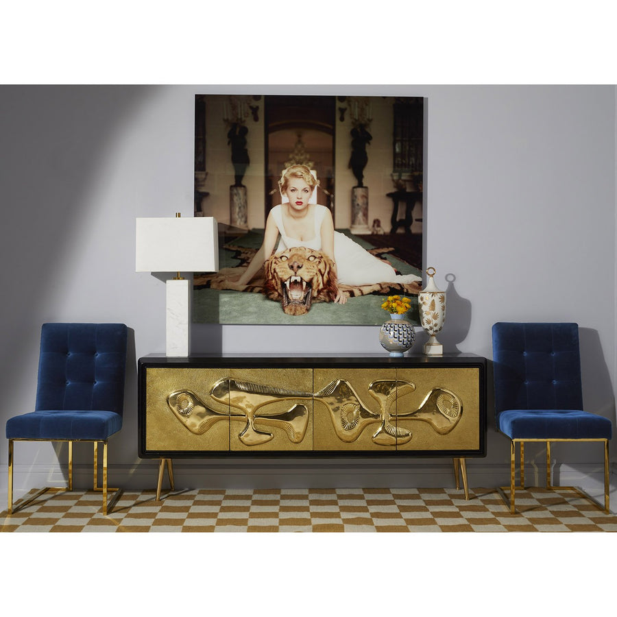 Jonathan Adler Botanist Ganja Urn vase with Versailles Puzzles Vase on a console table decor below the wall art print in interior available at Spacio India for Luxury Home Decor Accessories collection.