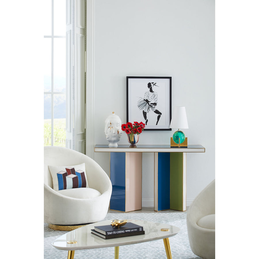 Jonathan Adler Muse Frida glided porcelain vase on a console table with other home decorative objects in a living room interior available at Spacio India for Luxury Home Decor Accessories collection.