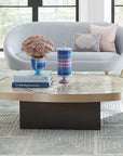 Jonathan Adler Scala Bowl with a Scala canister vase & books on a coffee table in a modern living room interior available at Spacio India for Luxury Home Decor Accessories collection.