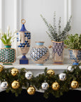 Christmas decoration with Jonathan Adler Cube Urn Vase with other Versailles Vases collection on a Console available at Spacio India for Luxury Home Decor Accessories collection.