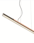 A KDLN Dala Linear Home Office Desk Ceiling Light, a modern suspension lamp with a harmonious synthesis of form and function, featuring a copper finish.