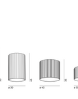 A black and white drawing of different sizes of KDLN glass cylinders in a retro style design.