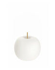 White apple shape table lamp with a gold stem on a white background