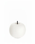 White apple-shaped table lamp on a white background from KDLN available at Spacio in India