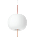 White pendant light with copper accents on a white background