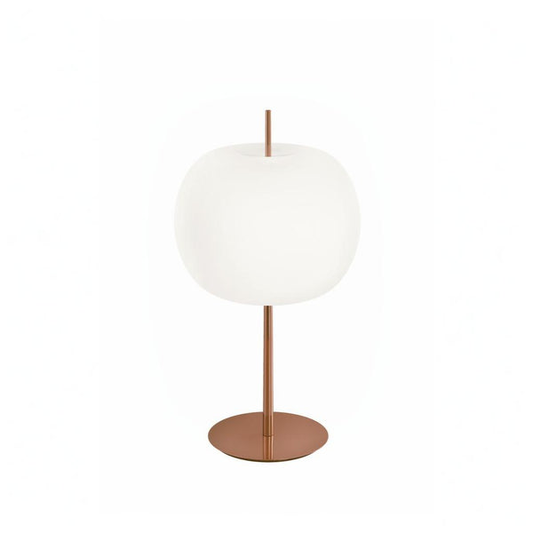 Table lamp with white shade and bronze base on a white background from KDLM available at Spacio in India