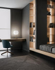 Modern bedroom with a desk, chair, and shelves.
