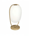 Table lamp with white shade and gold base on a white background from Kdln available at Spacio in India 