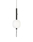 Pendant light with white glass shade and black metal fixture on a white background