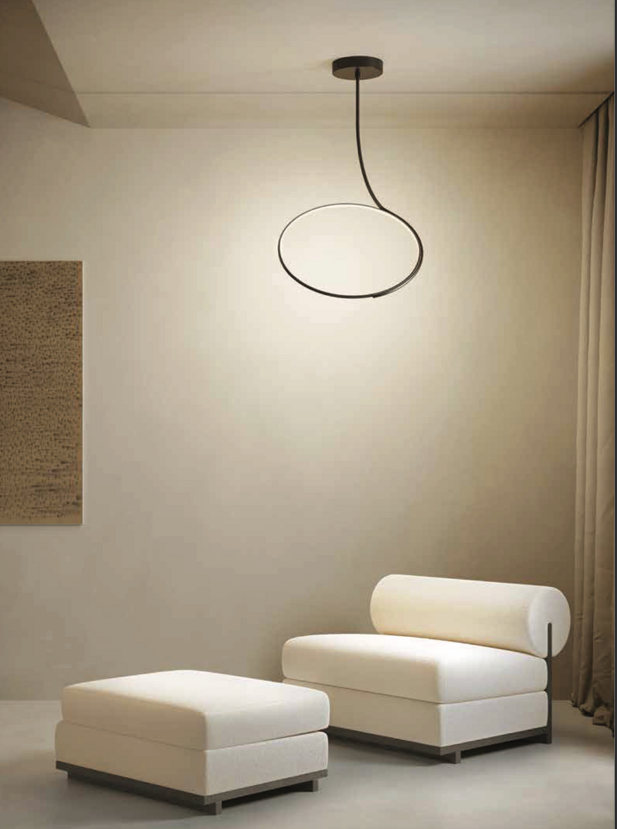 A room with two chairs and a KDLN Poise Ceiling Lamp by KDLN.