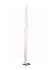 Tall, thin white candle style floor lamp on a white background from KDLN available at Spacio in India