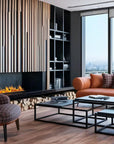 Modern living room with an artificial water vapour fireplace, sofa, and city view