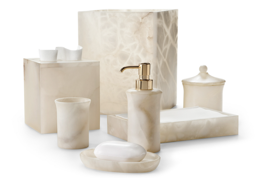 Cream onyx bathroom accessories set from Labrazel including a soap dispenser, soap dish, and containers on a white background.