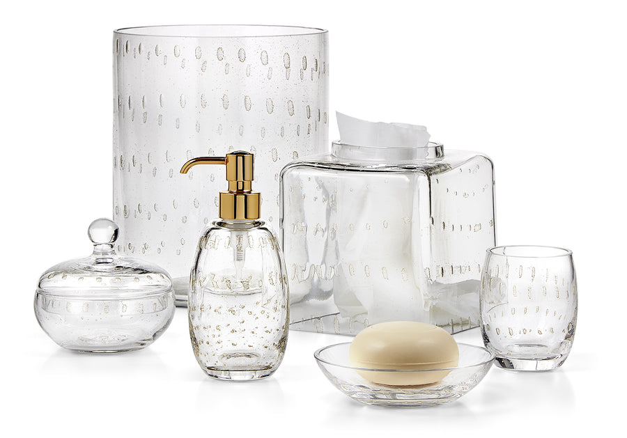 Labrazel Clear glass bathroom accessories with silver & gold accents on a white background in 