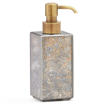 Soap dispenser with gold pump and textured silver and gold body on a white background from Labrazel at Spacio retail store in Mumbai
