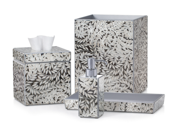 Bathroom accessory set with leaf pattern on a white background  from Labrazel on a white background at Spacio retail store in Mumbai