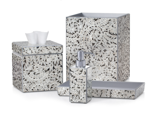 Bathroom accessory set with leaf pattern on a white background  from Labrazel on a white background at Spacio retail store in Mumbai