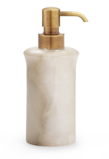 Cream soap dispenser on a white background
