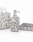 Three-piece bathroom accessory set featuring a tissue box cover, a pump dispenser, and a shallow tray, all decorated with a silver and white leaf pattern on a clear acrylic base.